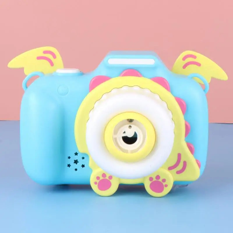 Blue bubble camera with yellow wings, a white bubble outlet, and pink paw accents.
