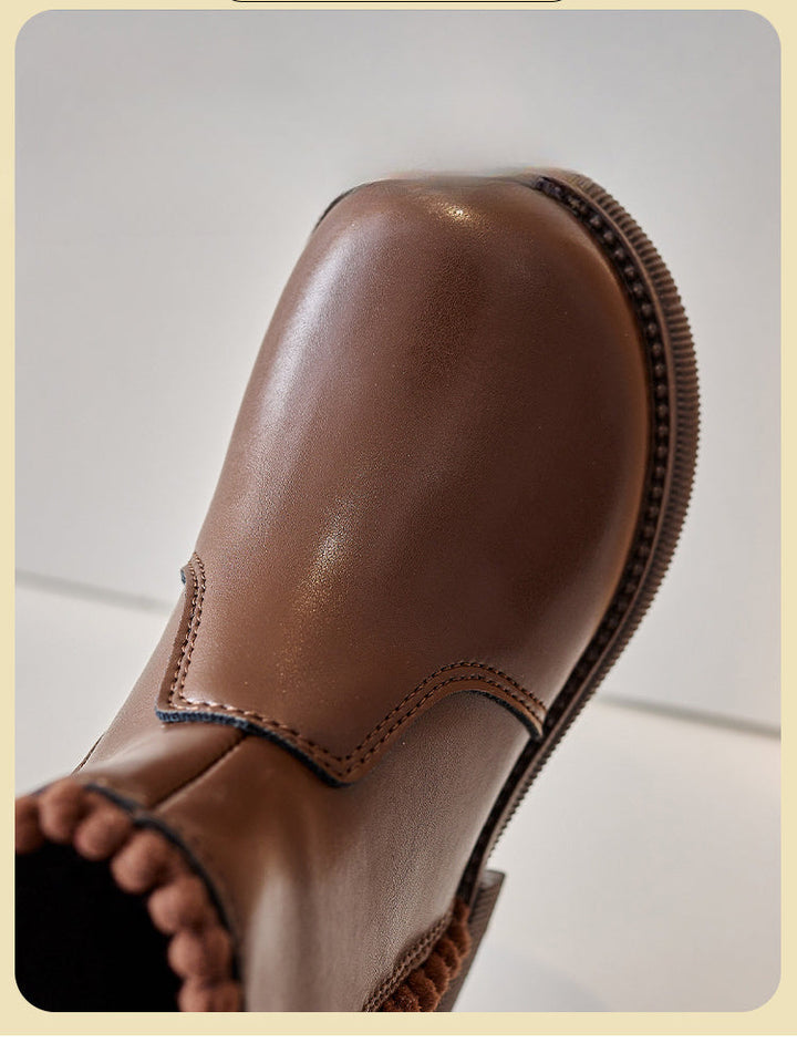 Close-up of a brown ankle boot&