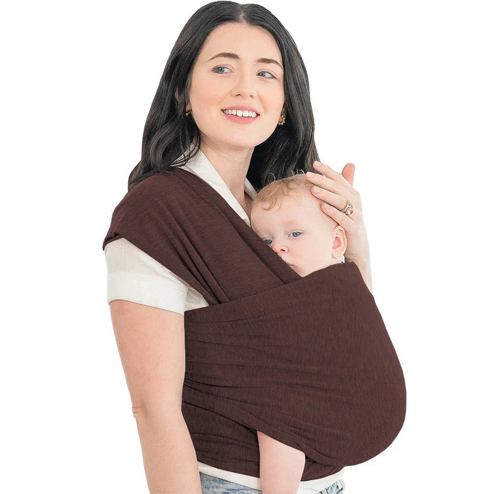 Brown baby wrap worn across a parent&