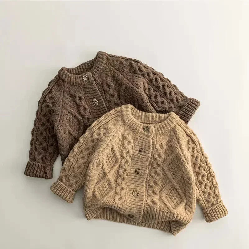 Brown and beige children's cardigans with cable-knit patterns and button fronts