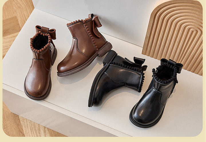 Brown and black ankle boots displayed together, showing both color options
