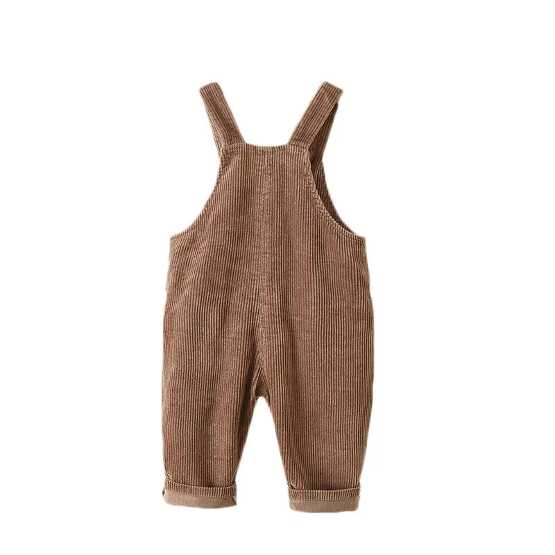 Back view of brown corduroy overalls with shoulder straps and rolled cuffs