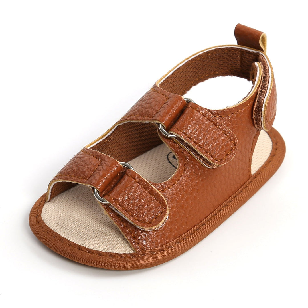 Brown open-toe baby sandal with two hook-and-loop straps