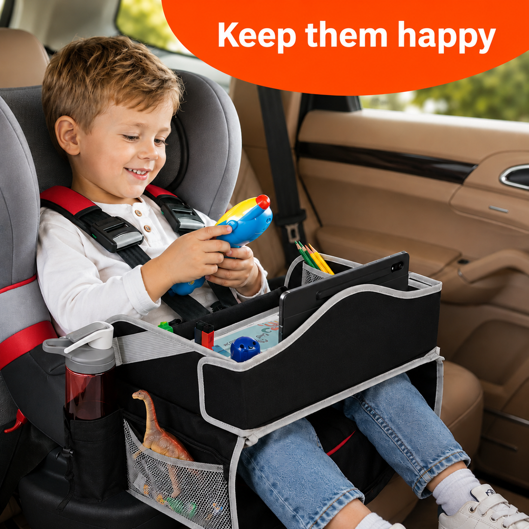 Child playing with a toy above a black travel tray in a car seat