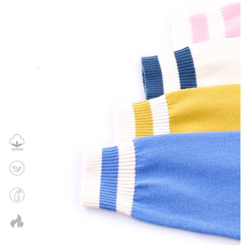 Layered cardigan sleeves in blue, yellow, beige white, and pink with contrasting ribbed cuffs