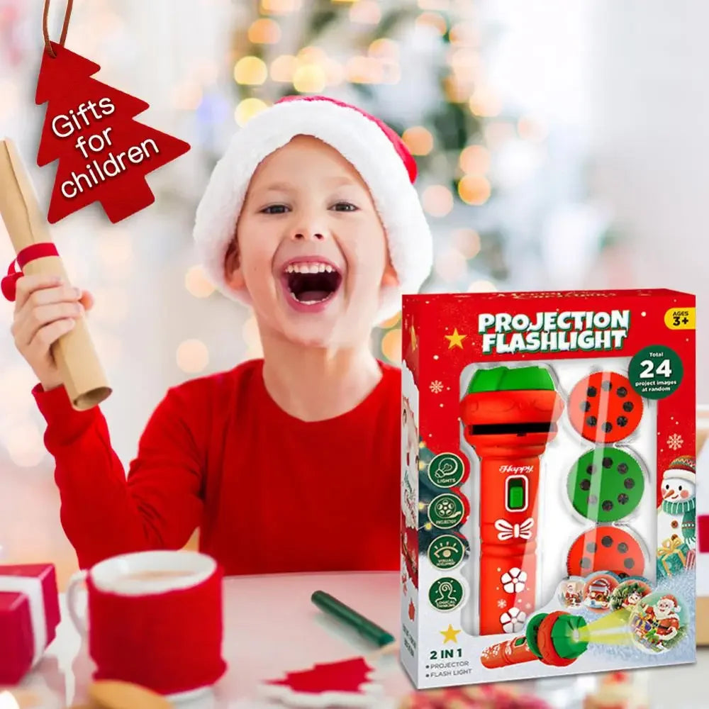 Child in a Santa hat beside a boxed Christmas projection flashlight