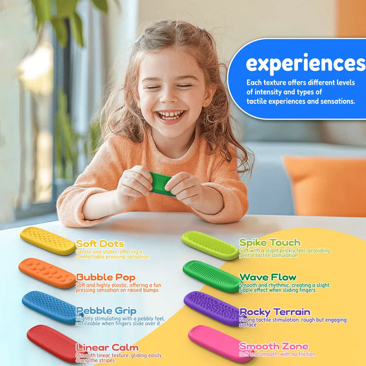 Child holding a green sensory strip above a table with eight differently textured strips.
