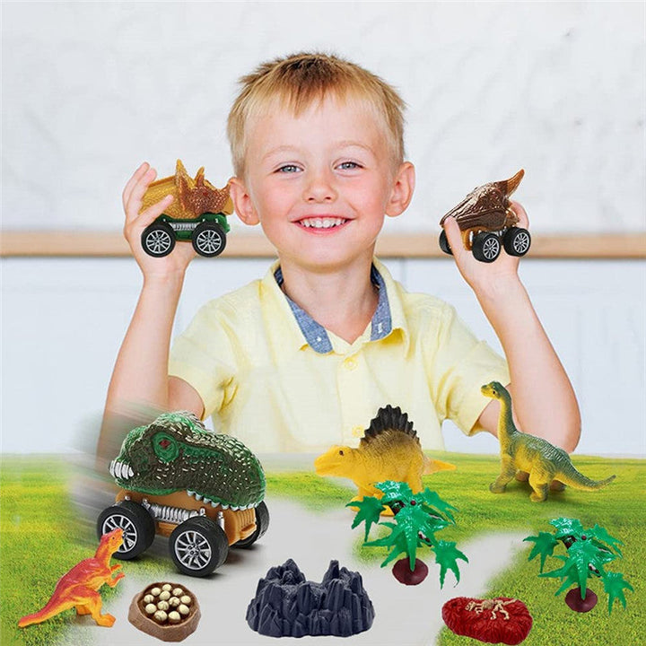 Child holding two dinosaur cars beside dinosaur figures and play accessories