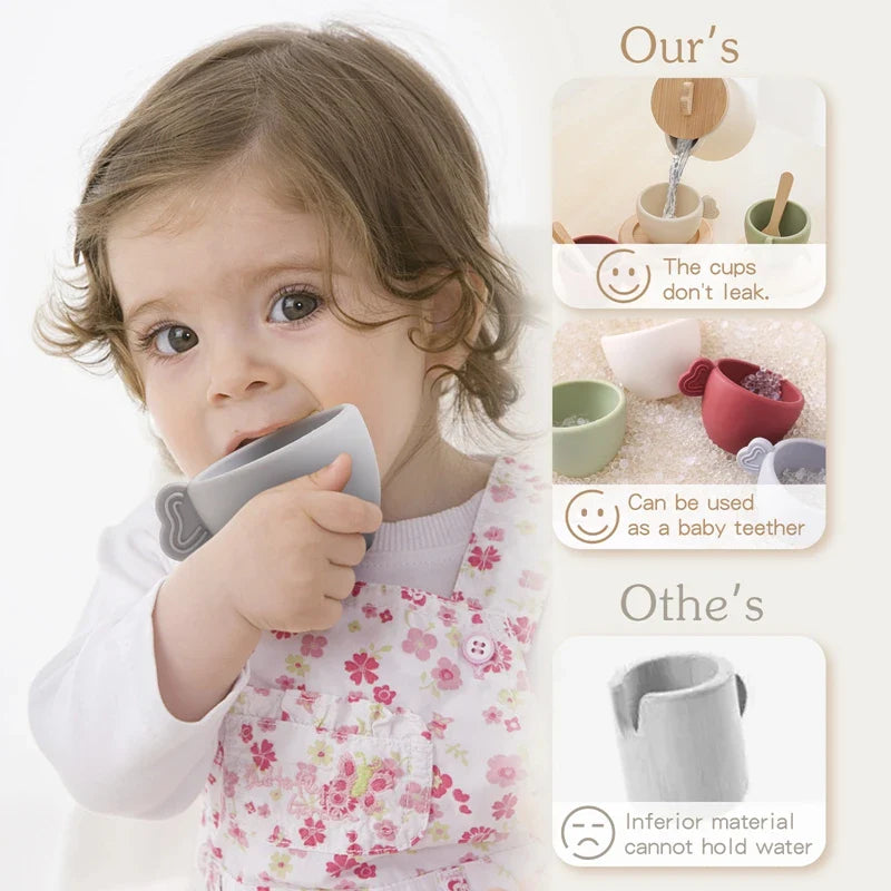 Child holding a gray toy teacup to their mouth