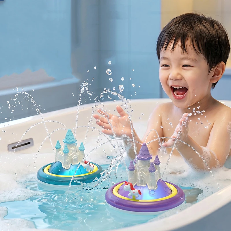 Child playing in a bathtub with two floating unicorn castle toys