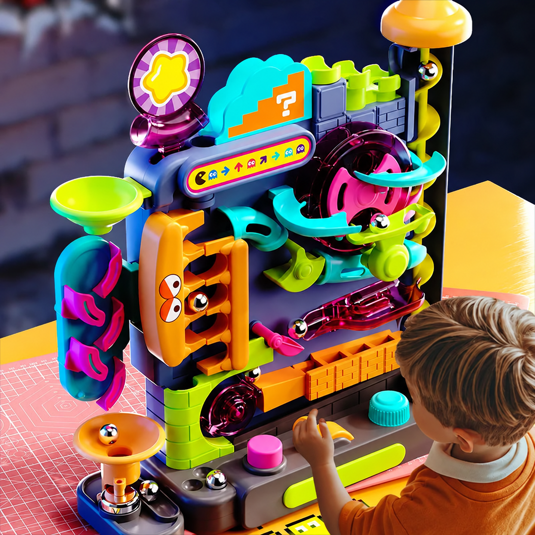 Child using the tabletop ball track with colorful ramps, wheels, and buttons