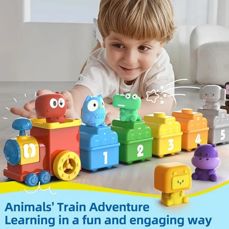 Child playing with a colorful number train and removable animal figures
