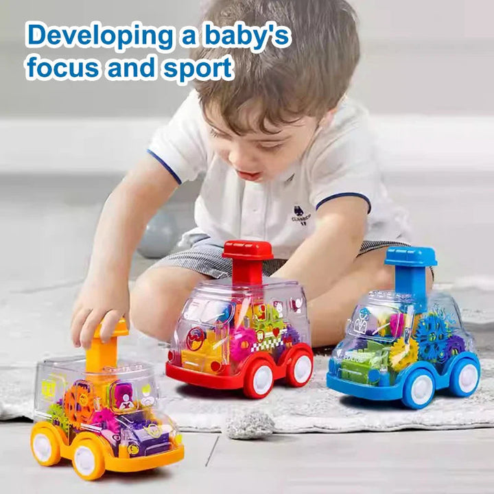 Child playing on the floor with a yellow school bus, red fire truck, and blue police toy car