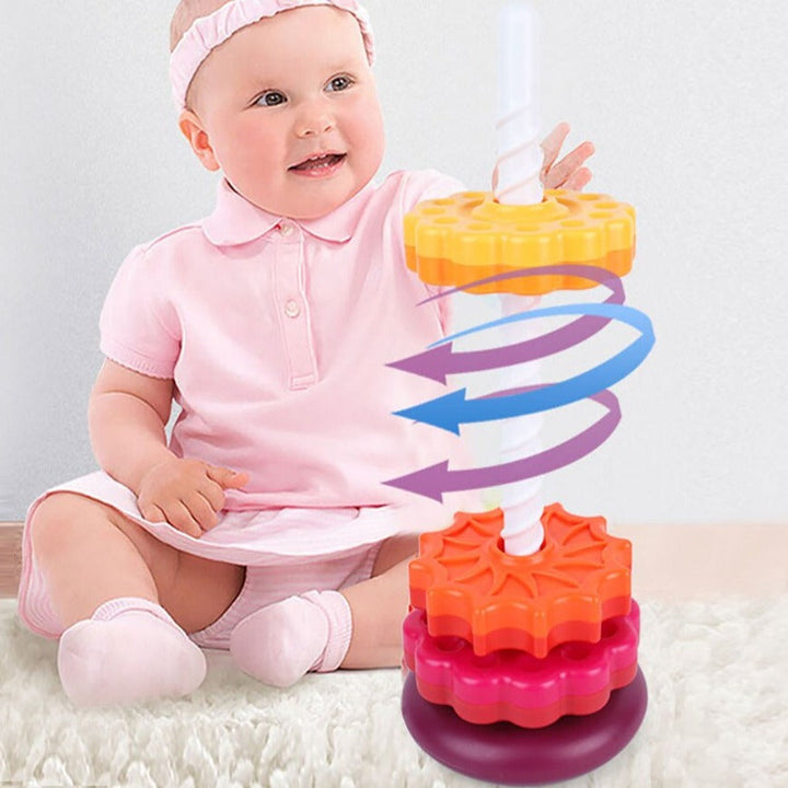 Child beside a stacking tower with arrows illustrating a yellow disc&
