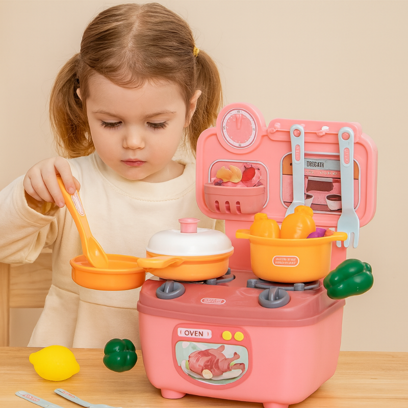 Child stirring a toy pan beside the pink play kitchen with cookware and play vegetables