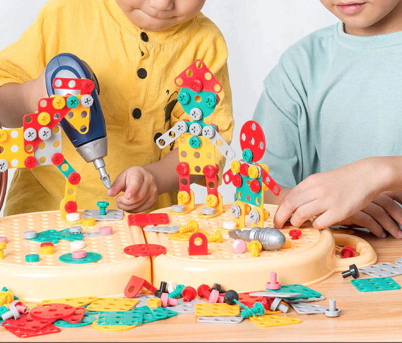 Two children assembling colorful constructions on a beige building base