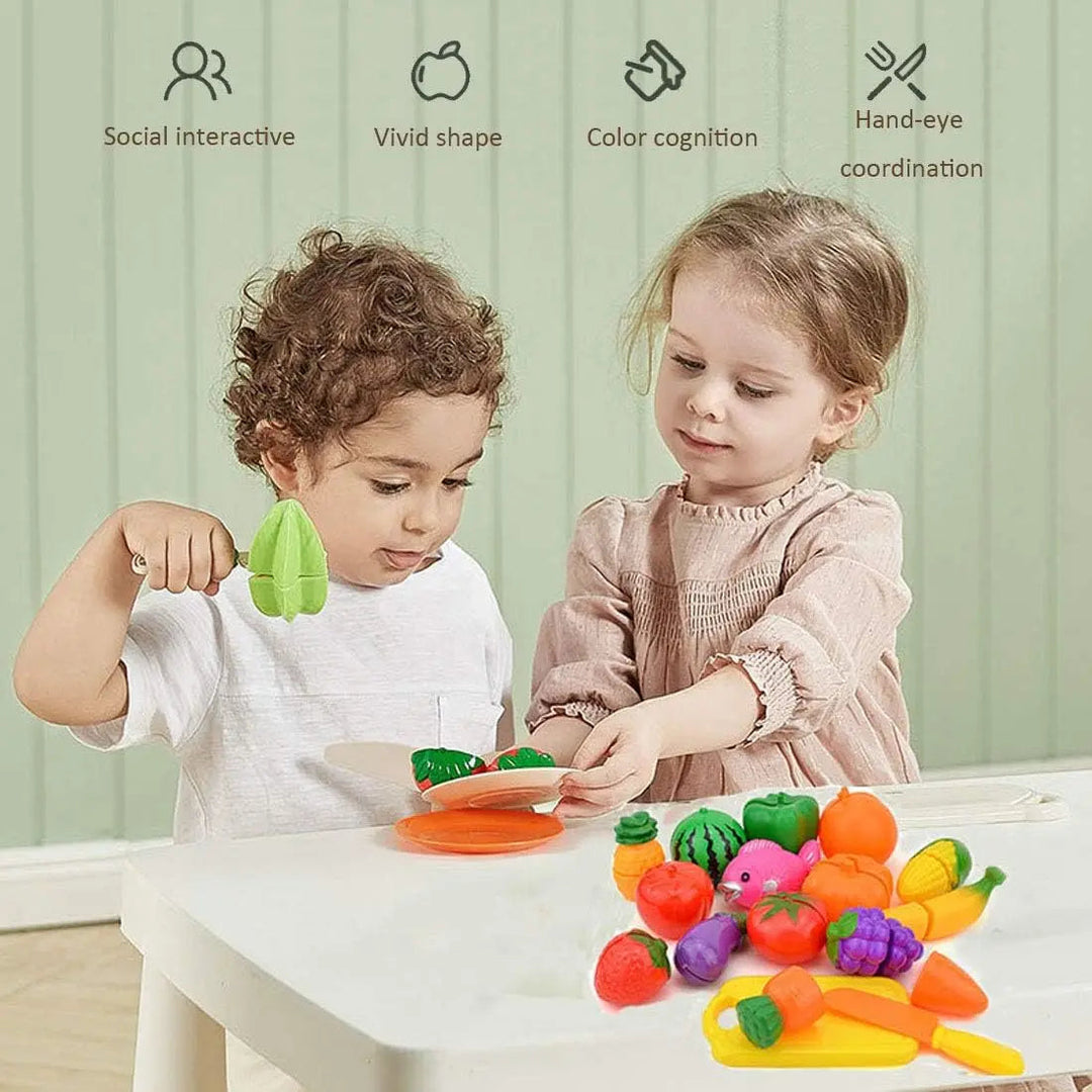 Two children preparing pretend food together with a cutting board and colorful toy fruits and vegetables