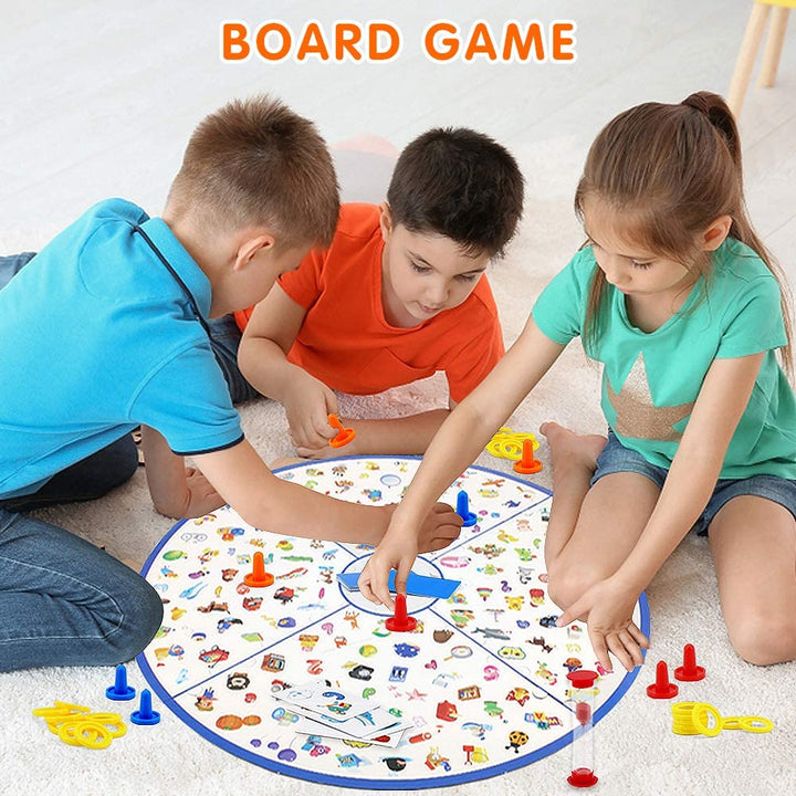 Three children looking for picture matches on the round game board