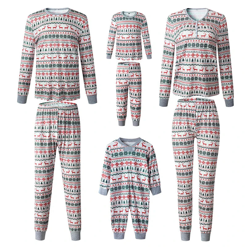 Adult and child pajama sets with a coordinating baby one-piece in a red, green, and white Christmas print