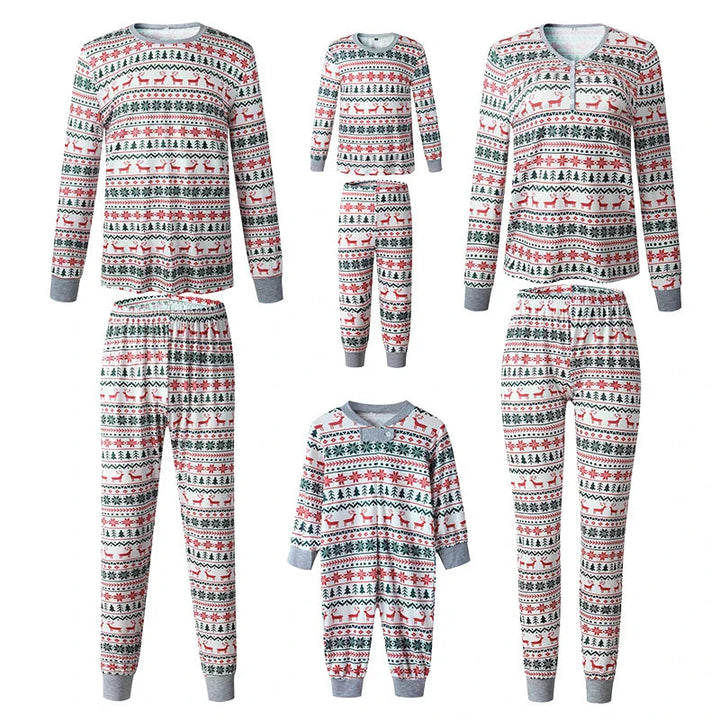 Adult and child pajama sets with a coordinating baby one-piece in a red, green, and white Christmas print