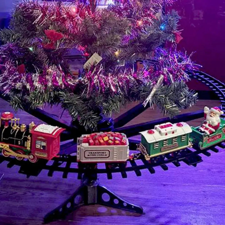 Holiday train on a circular track around the lower branches of a Christmas tree