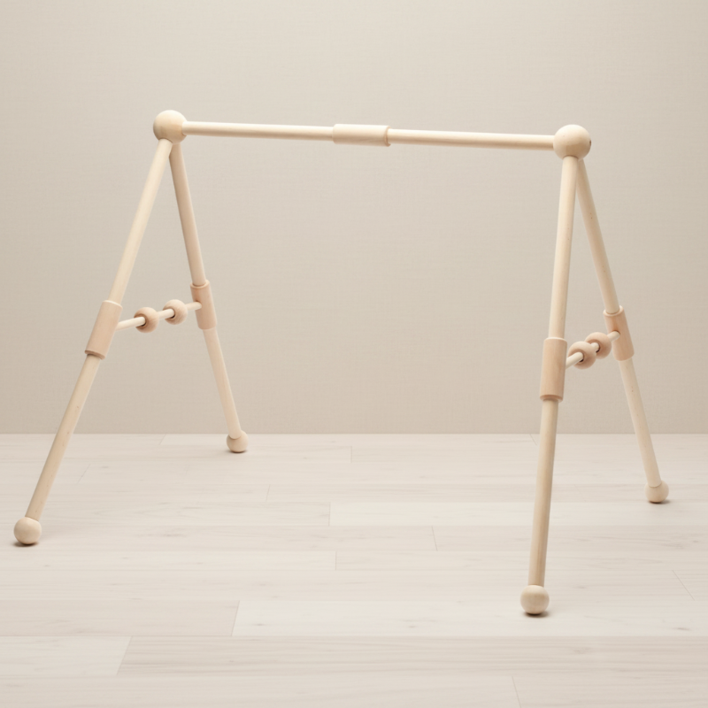 Classical wooden baby gym frame with a straight crossbar and angled legs.