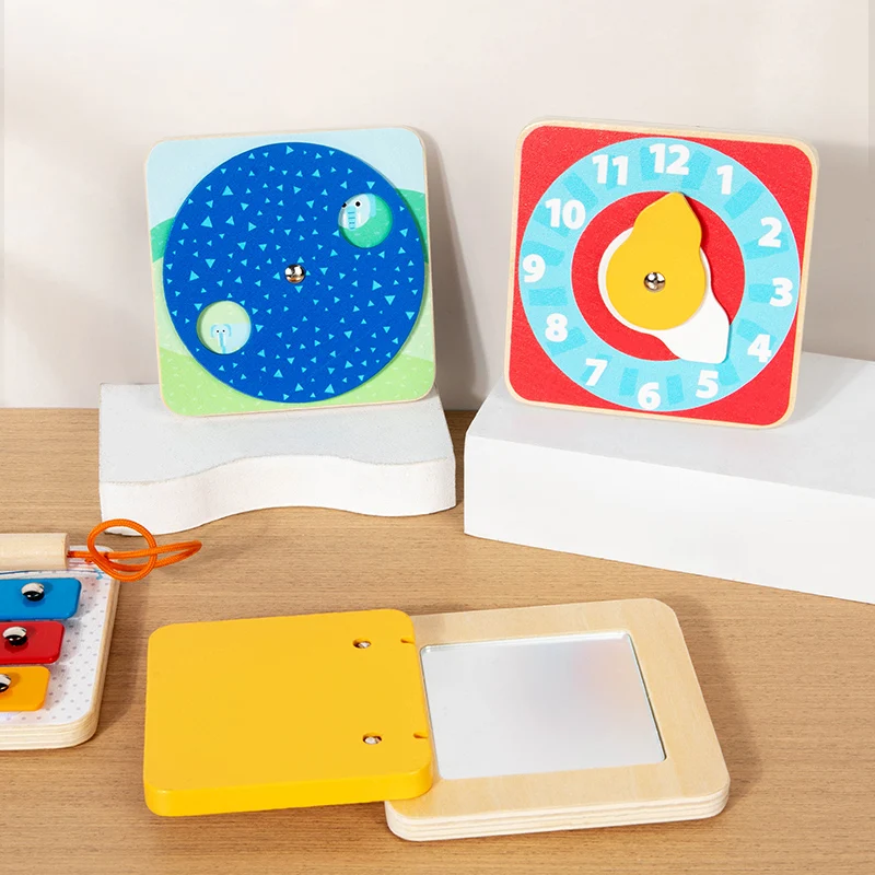 Clock and animal-matching boards above an open sun-cover mirror board.