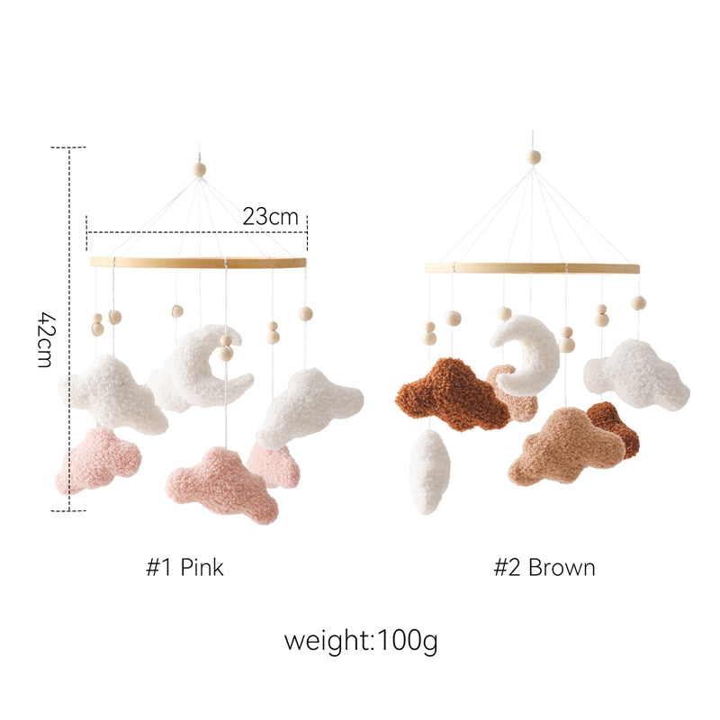 Pink and brown cloud mobiles with width, height, and weight markings