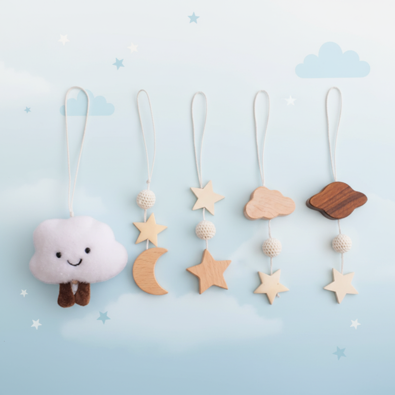 Cloud hanging toy set with a smiling fabric cloud, wooden stars, and a crescent moon.