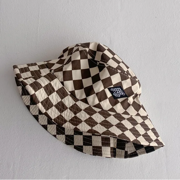 Coffee-and-cream checkered bucket hat with a stitched front patch