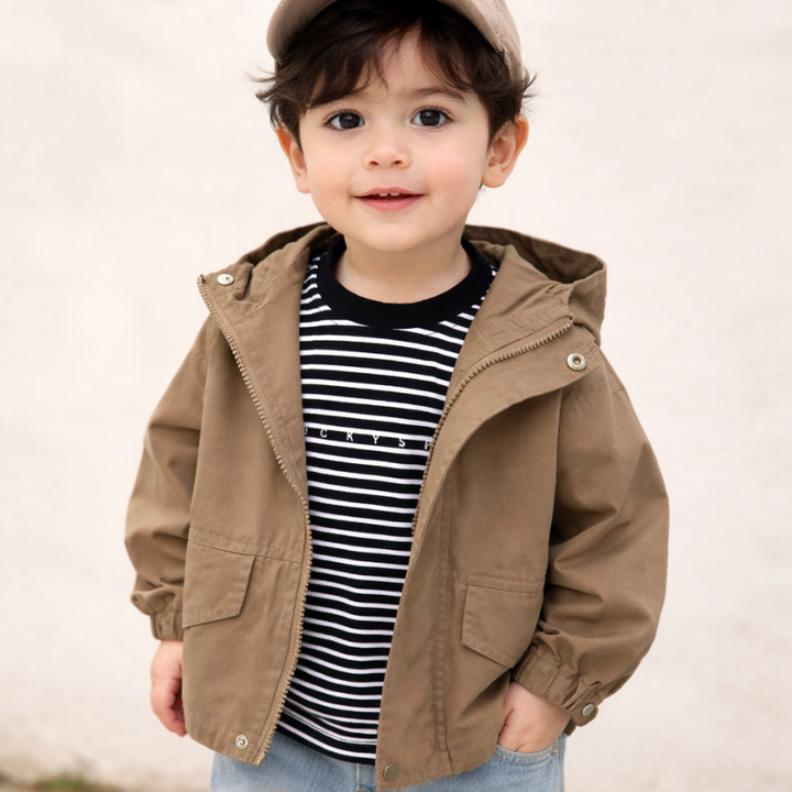 Child wearing an open coffee-colored hooded parka over a striped shirt