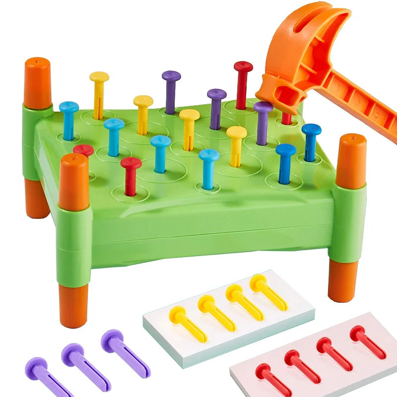 Green peg board with multicolored pegs, an orange toy hammer, and loose pegs arranged by color