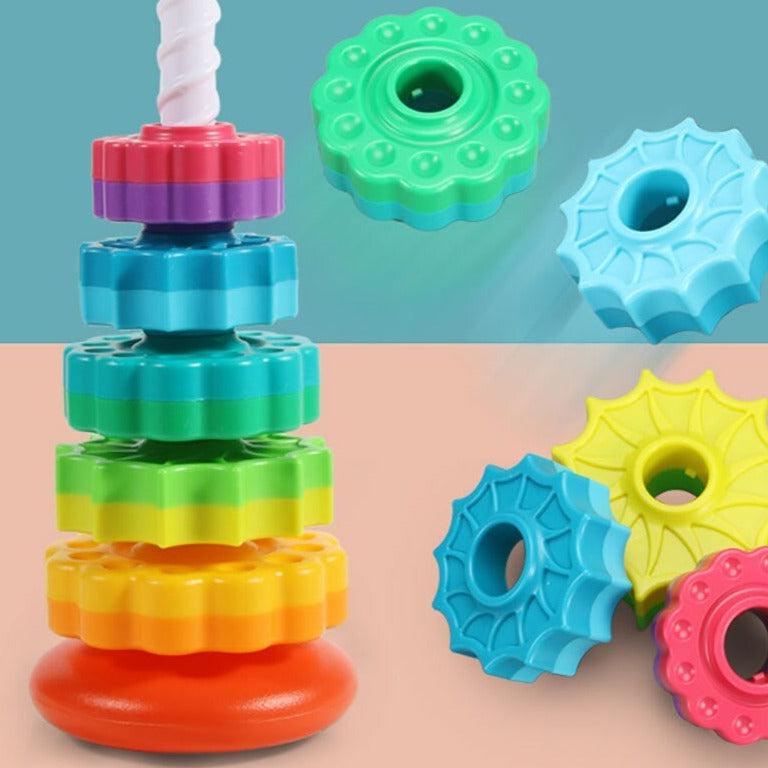 Colorful stacking discs on a spiral post with loose discs showing different shapes