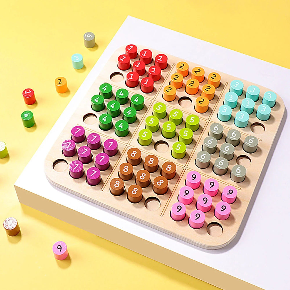 Angled view of the Sudoku board with colorful numbered pieces and several empty spaces