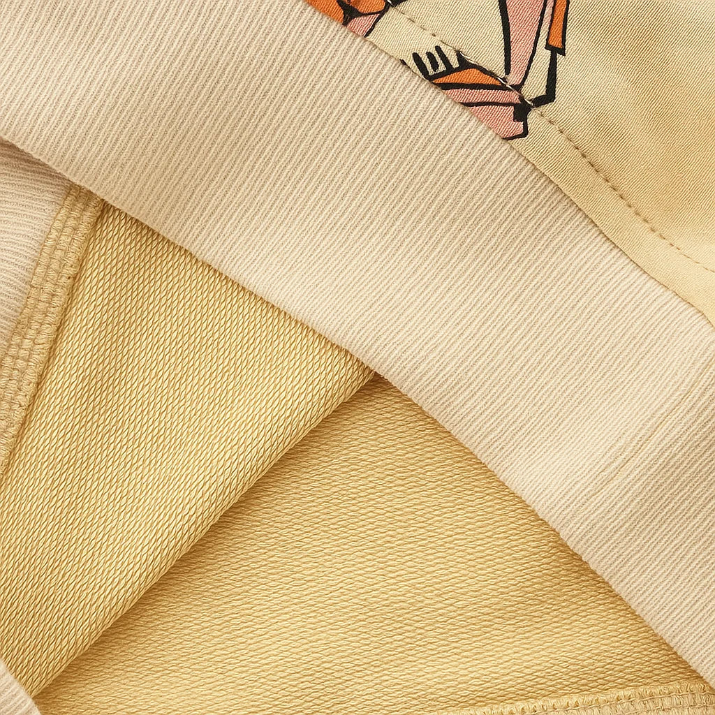Folded sweatshirt showing the inside fabric and ribbed edge
