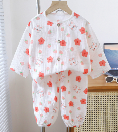 White pajama top and pants with coral flowers and rabbit illustrations