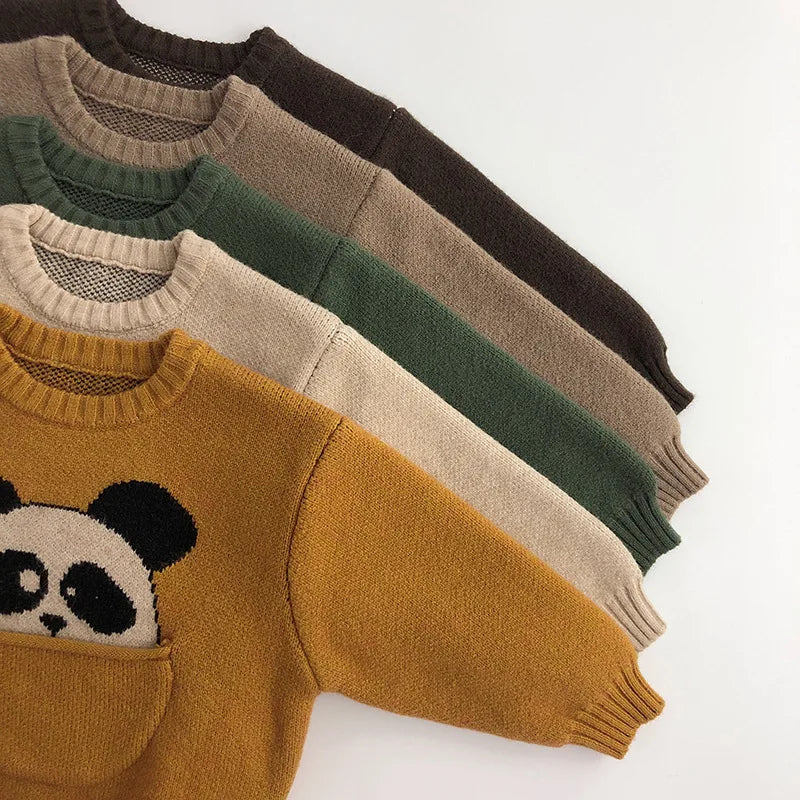Five animal knit sweaters layered to show color options, long sleeves, and ribbed cuffs