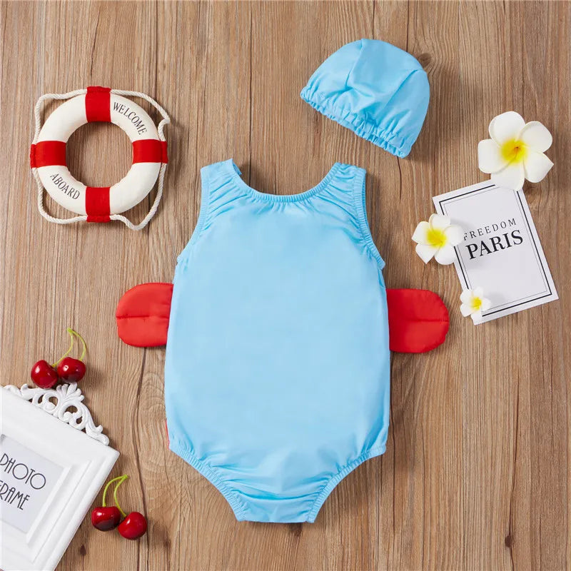Light blue back of the crab swimsuit with red side details and coordinating cap
