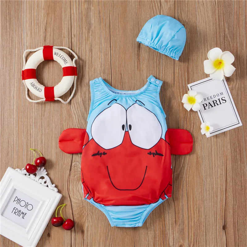 Front of the light blue crab swimsuit with red side details and matching swim cap
