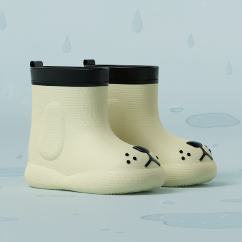 Cream dog-face rain boots with black top rims against a pale blue background