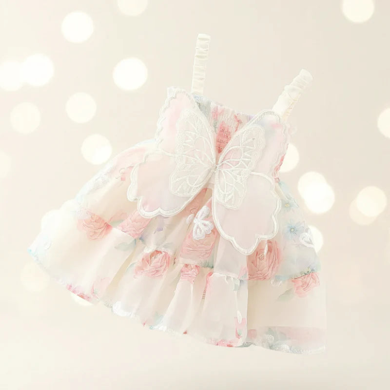 Cream floral baby dress with sheer butterfly wings at the back