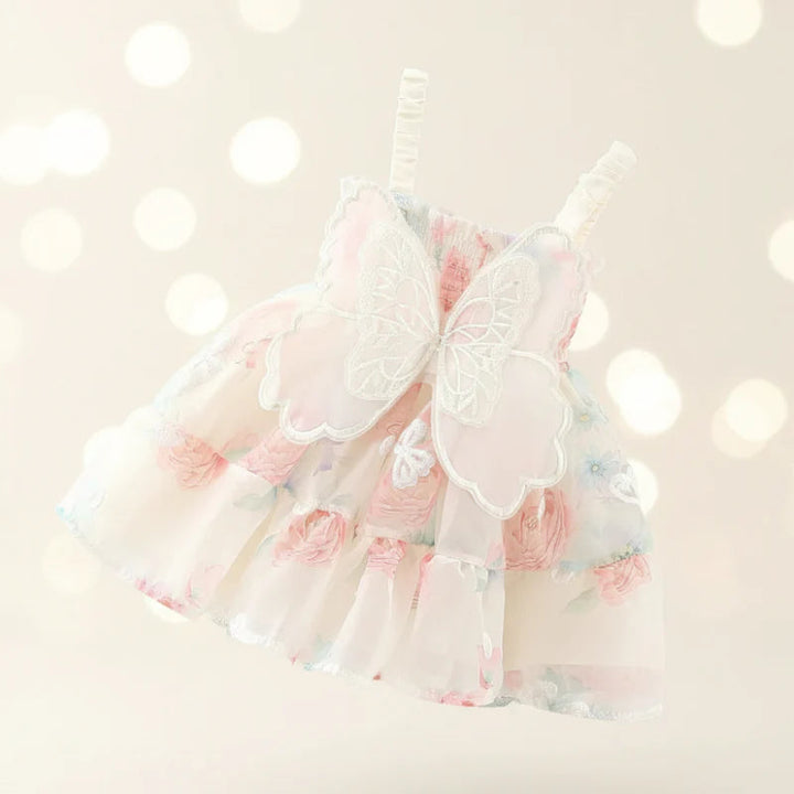Cream floral baby dress with sheer butterfly wings at the back