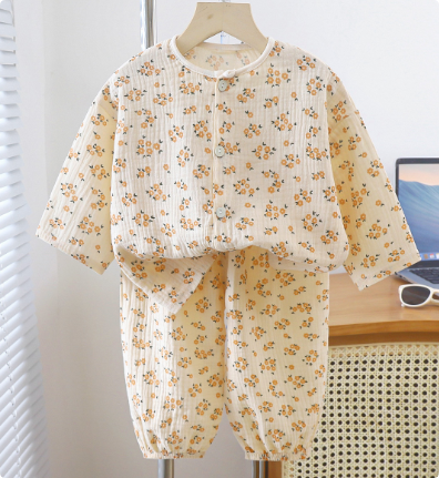 Cream two-piece pajamas with a small floral print and button-front top