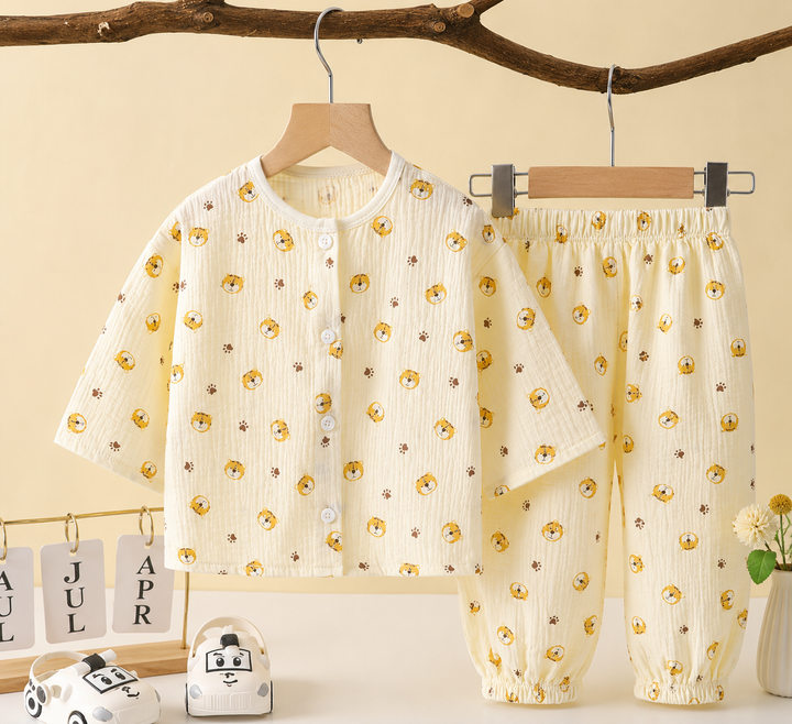 Cream pajama set with tiny yellow motifs, front buttons and matching pants
