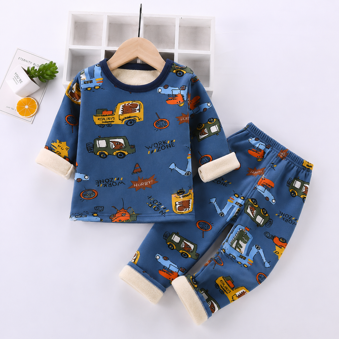 Dark blue pajama set with colorful construction vehicles and cream cuffs