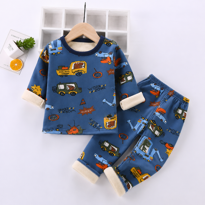 Dark blue pajama set with colorful construction vehicles and cream cuffs