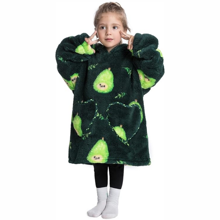 Child wearing a dark green avocado-print hooded blanket