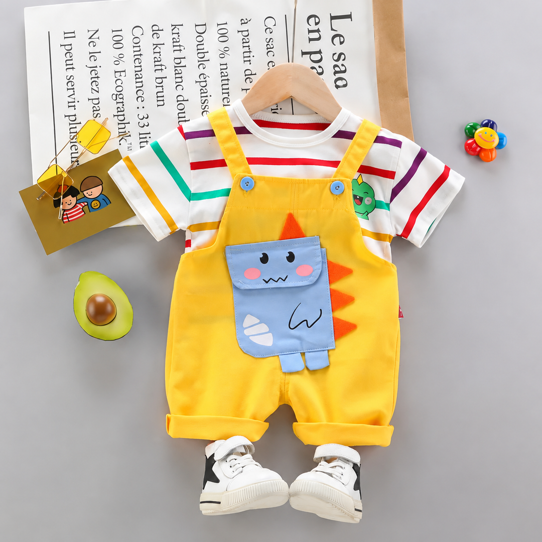 Yellow dinosaur short overalls paired with a multicolored striped T-shirt