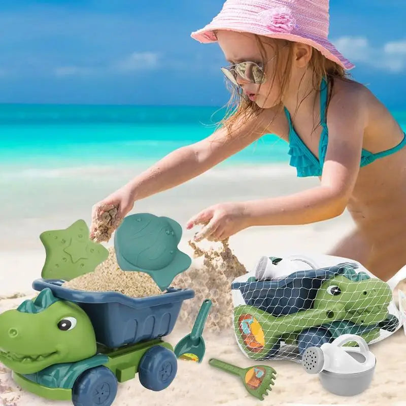 Dinosaur dump truck, sand molds, and watering can being used at the beach