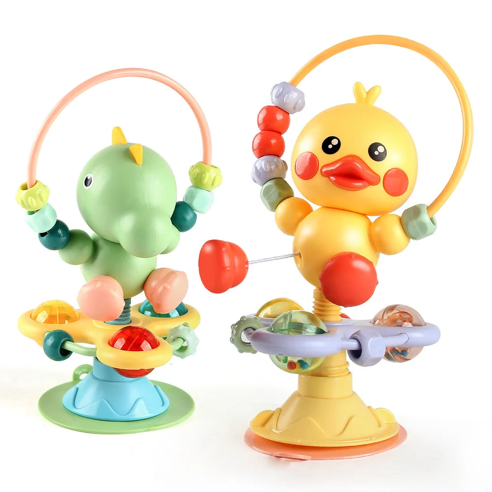 Green dinosaur and yellow duck rattles with bead loops and suction cup bases